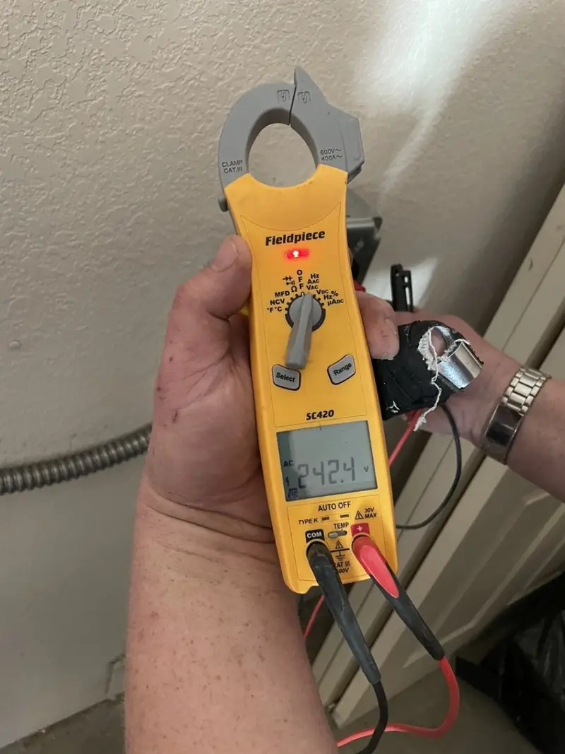 Voltage testing with clamp meter during Electrical Installation Services in Ormond-by-the-Sea